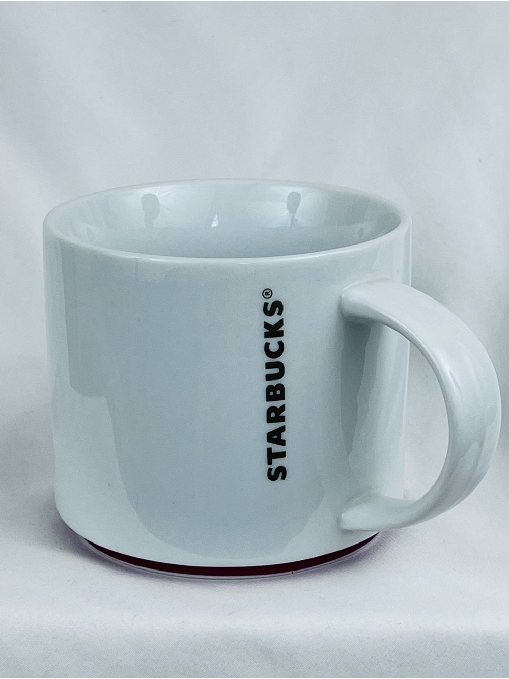 Starbucks Coffee Mug 2012 White Stackable Embossed Gold Logo W/ Red Trim